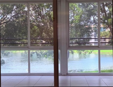 Lake Condo For Sale in Coconut Creek, Florida