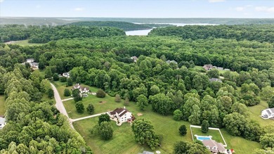 This custom-built one-and-a-half story home over a full walk-out - photo 2