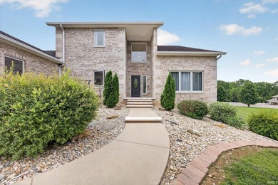 This custom-built one-and-a-half story home over a full walk-out - photo 3