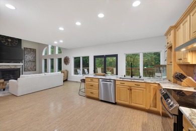 This custom-built one-and-a-half story home over a full walk-out - photo 7