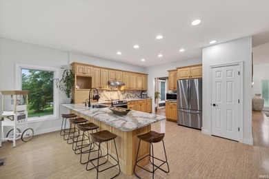 This custom-built one-and-a-half story home over a full walk-out - photo 8