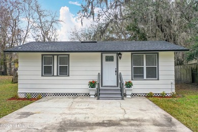 renovated and move-in ready, this 3-bedroom, 2-bath home offers - photo 3