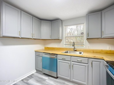 renovated and move-in ready, this 3-bedroom, 2-bath home offers - photo 8