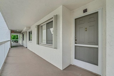This turnkey 55+ community condo is move-in ready, featuring a - photo 2