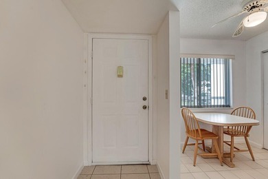 This turnkey 55+ community condo is move-in ready, featuring a - photo 3