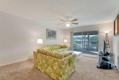 This turnkey 55+ community condo is move-in ready, featuring a - photo 5
