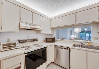 This turnkey 55+ community condo is move-in ready, featuring a - photo 9