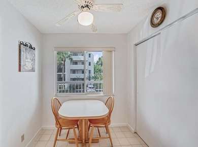 This turnkey 55+ community condo is move-in ready, featuring a - photo 10