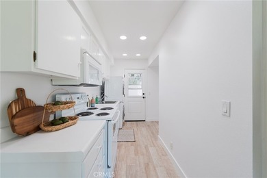 Welcome Home to this Beautifully Maintained Updated End-Unit - photo 12