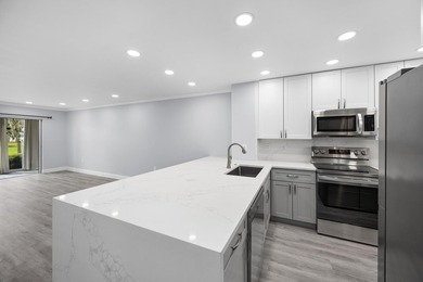 Welcome to this beautifully renovated condo offering a bright - photo 12