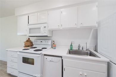 Welcome Home to this Beautifully Maintained Updated End-Unit - photo 13
