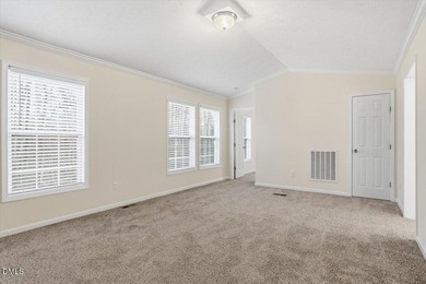 This beautiful home is set on nearly one acre of fully fenced