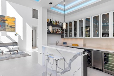 Located in Las Olas Isles, this modern residence by CES Design - photo 18