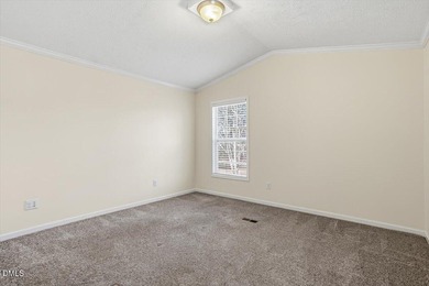 This beautiful home is set on nearly one acre of fully fenced