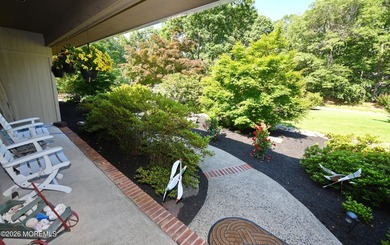 Welcome to this sprawling ranch tucked away on a tree-lined - photo 5