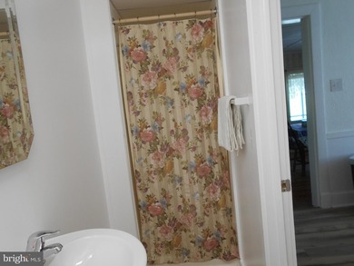 Updated 3-bedroom, 2-bath waterfront home on Hudson Creek offers - photo 13
