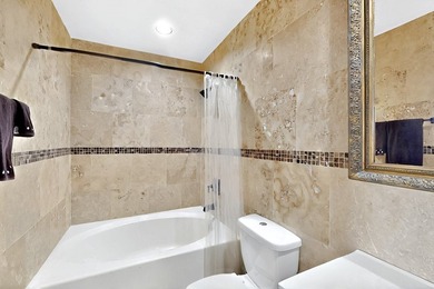 Discover this beautifully updated 2-bedroom, 2-bath condo on the - photo 21