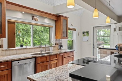 This two-level condominium offers a spacious and comfortable - photo 11