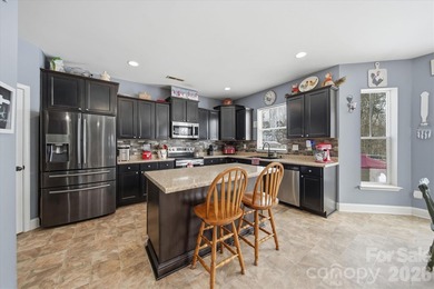 MOTIVATED SELLER! This wonderful home is located inside a gated - photo 17