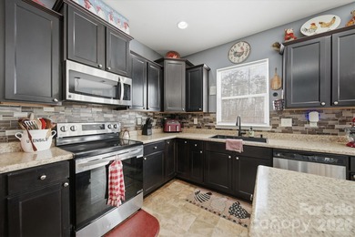 MOTIVATED SELLER! This wonderful home is located inside a gated - photo 19