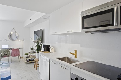 Spacious studio with updates and gorgeous West sunset views. New