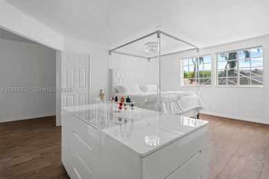 Step into luxury in this highly renovated 4-bedroom, 2.5-bath - photo 18