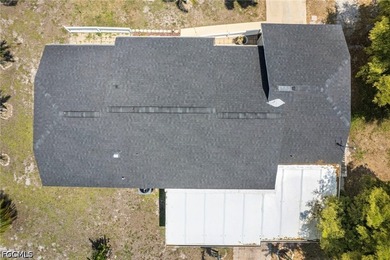 Welcome to this newly listed home in NE Cape Coral! This - photo 8