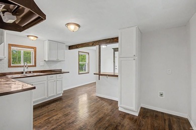 GREAT location and room to grow! This updated 3 bed 1 bath home - photo 8