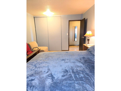 This rare 17th-floor, two-bedroom, one-bathroom condo offers - photo 16