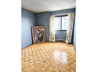 This rare 17th-floor, two-bedroom, one-bathroom condo offers - photo 18