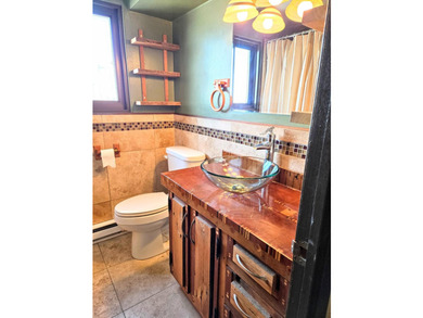 This rare 17th-floor, two-bedroom, one-bathroom condo offers - photo 19