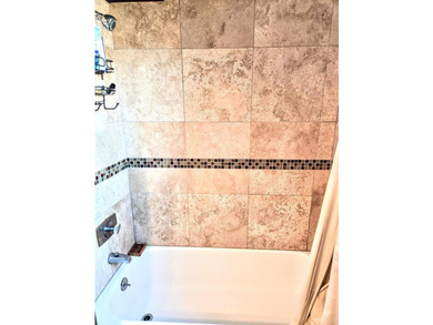 This rare 17th-floor, two-bedroom, one-bathroom condo offers - photo 21