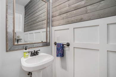 Inlet Living at Its Best! Welcome to this charming raised beach