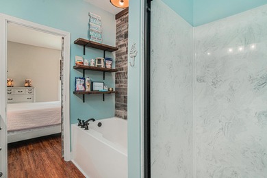 Inlet Living at Its Best! Welcome to this charming raised beach