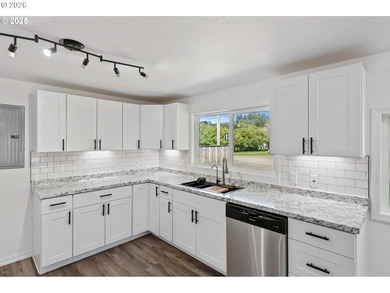 Discover coastal living at its best in this beautifully updated - photo 8