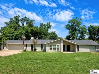 Step into timeless style with this spacious Mid-Century Modern