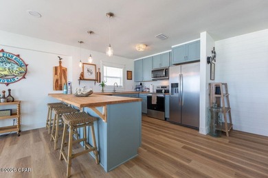 Beachfront Gem on Gulf Drive -- Tastefully Remodeled with 50 - photo 14
