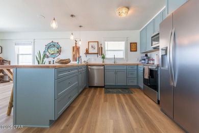Beachfront Gem on Gulf Drive -- Tastefully Remodeled with 50 - photo 15