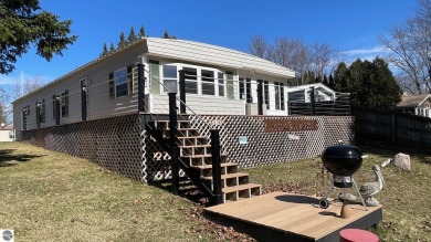 Lake Home For Sale in Weidman, Michigan