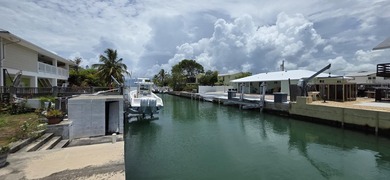 3-bedroom, 2-bath waterfront stilted home offers the perfect - photo 2