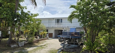 3-bedroom, 2-bath waterfront stilted home offers the perfect - photo 5