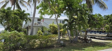3-bedroom, 2-bath waterfront stilted home offers the perfect - photo 6