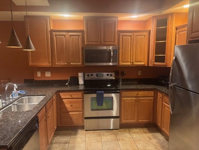 Exceptional value! This condo is located on the third floor at - photo 10