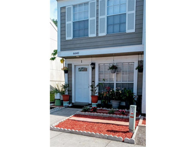 This beautiful 2-bedroom two full bath townhome is located at - photo 1