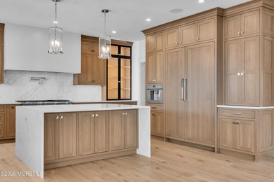 Spectacularly designed 5/6 bedroom, 6 bath bayfront home is - photo 9