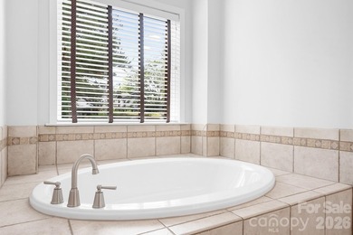 Big and beautiful, this impressive home sits proudly on an - photo 23