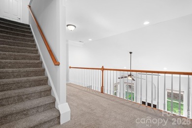 Big and beautiful, this impressive home sits proudly on an - photo 25