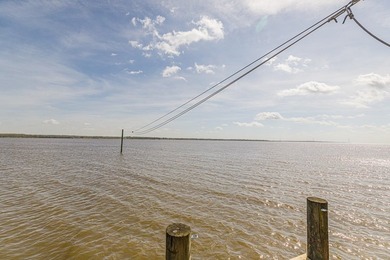Experience true waterfront living with this custom-built - photo 5