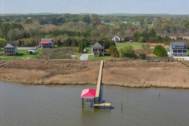 Experience true waterfront living with this custom-built - photo 9