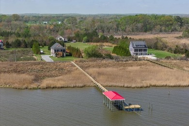 Experience true waterfront living with this custom-built - photo 10